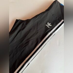 Adidas new with tags high ride standard length women’s biker shorts. Size XS.